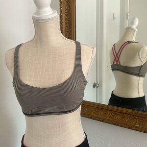 lululemon Free to Be bra - black/cream stripe w/ pink straps.